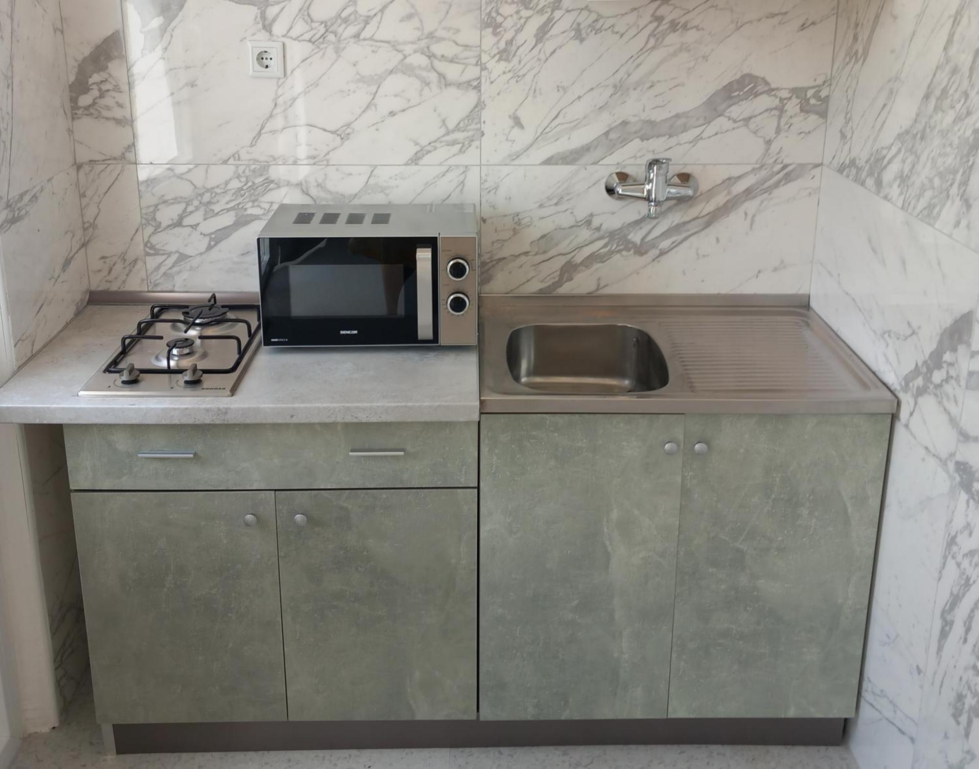 Apartmani Urlic Sreser Phòng bức ảnh